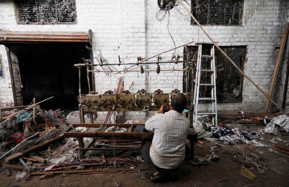 Hindistan'da dokuma fabrikalarının 'gariban' yüzü 11