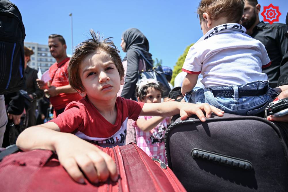'Gönüllü olarak' Türkiye'den Suriye'ye geri gönderil 12