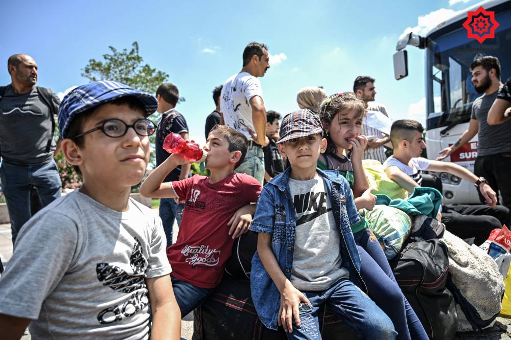 'Gönüllü olarak' Türkiye'den Suriye'ye geri gönderil 14